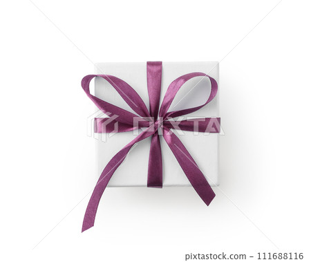 Top view of white gift box with violet ribbon isolated on white background Top view of white gift box with violet ribbon isolated on white background 111688116
