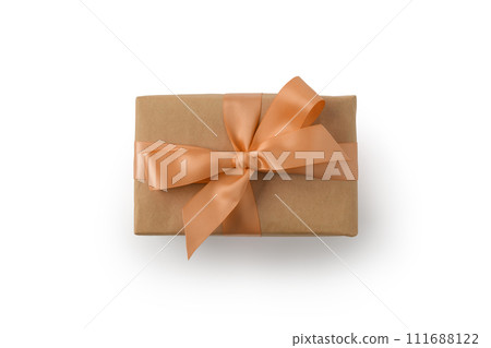 Top view of brown rectangular present box with orange ribbon isolated on white background 111688122