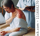 Patient with shingles being examined 111688270