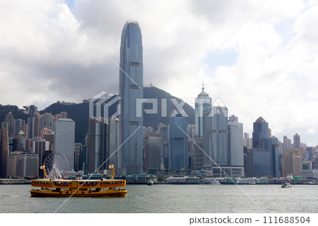 Star ferry sailing through Victoria Bay in Hong Kong Star ferry sailing through Victoria Bay in Hong Kong 111688504
