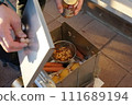 person smoking in the garden 111689194