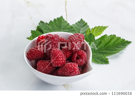 Rope sweet juicy raspberry heap 111690038