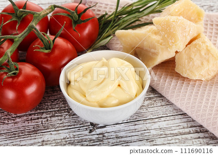 Cheese sauce in the bowl 111690116