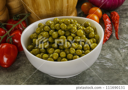 Sweet canned young green peas Sweet canned young green peas 111690131