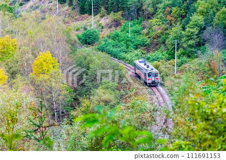Sekihoku Main Line Kiha 54 going through Jomon Pass Sekihoku Main Line Kiha 54 going through Jomon Pass 111691153