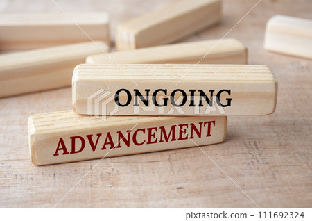 Enduring advancement text on wooden blocks. Operational excellence concept 111692324