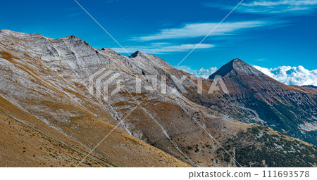 View of the Vihren peak from the Sukhodolsky pass. Trekking route to Bansko - Yavorov hut - Vihren hut. 111693578