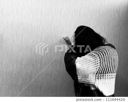 Regretful female monochrome 111694420