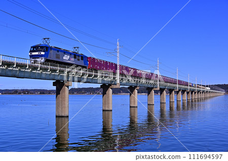 Freight train crossing Kitaura 111694597