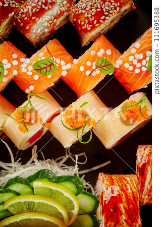 Vibrant assorted sushi rolls with salmon, eel, tuna, mamenori 111695388