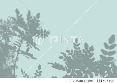 Natural light casts a shadow from the leaves of the tree on the blue wall. Mockup Natural light casts a shadow from the leaves of the tree on the blue wall. Mockup 111695390