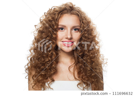 Charming redhead female model with long frizzy ginger hair and clean soft fresh skin posing Charming redhead female model with long frizzy ginger hair and clean soft fresh skin posing 111696632