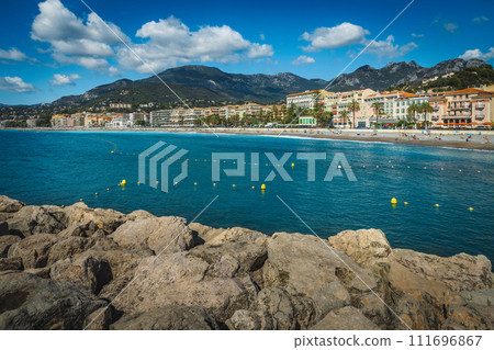Seaside buildings and famous beach of Menton, France Seaside buildings and famous beach of Menton, France 111696867