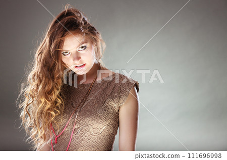 Mysterious enigmatic attractive woman girl. Mysterious enigmatic attractive woman girl. 111696998