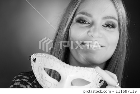 Sensual lady holding carnival mask. Sensual lady holding carnival mask. 111697119
