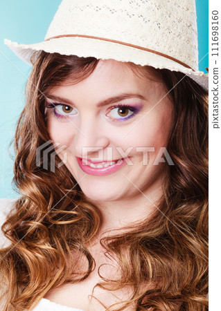 Charming woman in summer straw hat 111698160