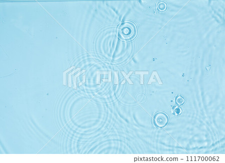 Abstract water cosmetic background with rings, water surface. Spa concept. Splash cosmetic moisturizer water micellar toner or emulsion 111700062