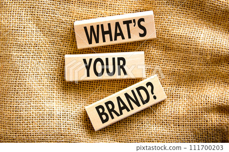 Branding and what is your brand symbol. Concept words What is your brand on beautiful blocks. Beautiful canvas table canvas background. Business branding what is your brand concept. Copy space. 111700203