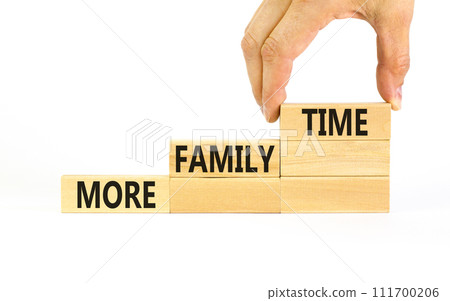 More family time and support symbol. Concept words More family time on wooden blocks. Businessman hand. Beautiful white table white background. Business, more family time qoute concept. Copy space. More family time and support symbol. Concept words More family time on wooden blocks. Businessman hand. Beautiful white table white background. Business, more family time qoute concept. Copy space. 111700206