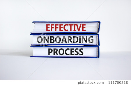 Effective onboarding process symbol. Books with words 'effective onboarding process' on beautiful white background. Business and effective onboarding process concept. Copy space. Effective onboarding process symbol. Books with words 'effective onboarding process' on beautiful white background. Business and effective onboarding process concept. Copy space. 111700218