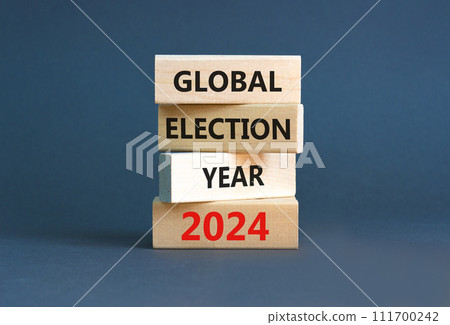 Global election year 2024 symbol. Concept words Global election year 2024 on beautiful wooden block. Beautiful grey table grey background. Business Global election year 2024 concept. Copy space. Global election year 2024 symbol. Concept words Global election year 2024 on beautiful wooden block. Beautiful grey table grey background. Business Global election year 2024 concept. Copy space. 111700242