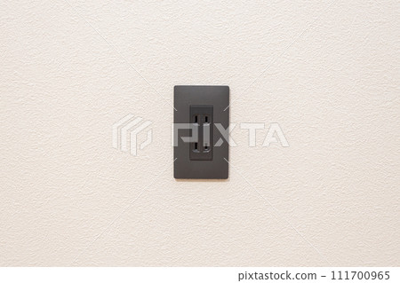 Outlet installed on the wall (black) Outlet installed on the wall (black) 111700965