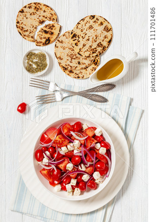 tomato salad with red onion and white cheese tomato salad with red onion and white cheese 111701486