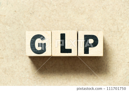 Alphabet letter block in word GLP (Abbreviation of Good laboratory practice) on wood background Alphabet letter block in word GLP (Abbreviation of Good laboratory practice) on wood background 111701750
