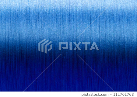 Closed up of blue color of thread textured background (Focus at center of picture) Closed up of blue color of thread textured background (Focus at center of picture) 111701768