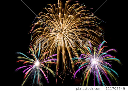 Beautiful fireworks in the summer night sky. Fireworks display image. Beautiful fireworks in the summer night sky. Fireworks display image. 111702349