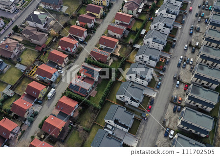 European urban suburban cityscape, aerial view of residential houses and yards 111702505