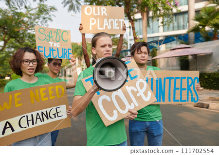 Eco activists calling on governments and corporations to take action to protect our planet 111702554