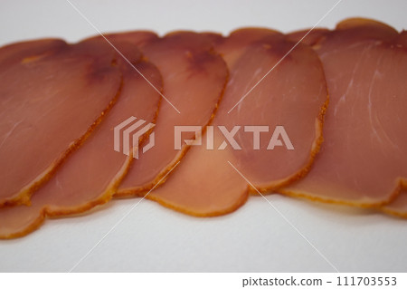 Sliced Cured Ham on White Background Sliced Cured Ham on White Background 111703553