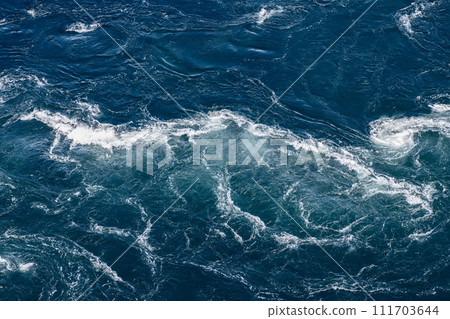 Exquisite nature's display, Saltstraumen's strong tidal currents craft water textures Exquisite nature's display, Saltstraumen's strong tidal currents craft water textures 111703644