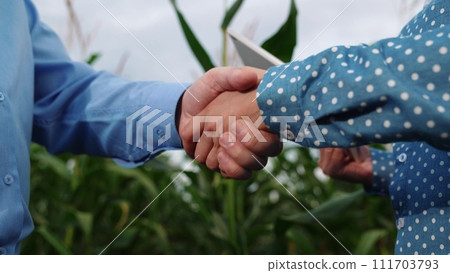agriculture, farmers handshake field, business corn farm, farmer working tablet with partner, business handshake, occupation, sunlight, farming life, successful, garden, shaking hands, gathering 111703793
