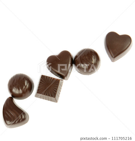 Chocolate candies isolated on white. There is free space for text. 111705216