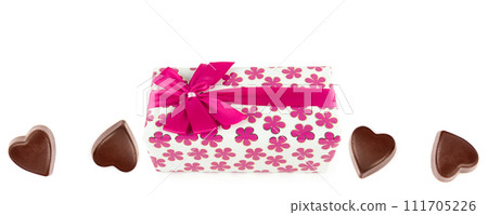 Gift white box with pink satin ribbon isolated on white. Congratulations on Women's Day, Mother's Day, Valentine's Day, Happy Birthday 111705226