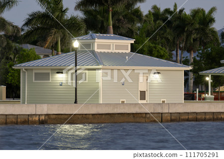 Public restrooms on Harborwalk at Gilchrist Park in Punta Gorda, Florida 111705291