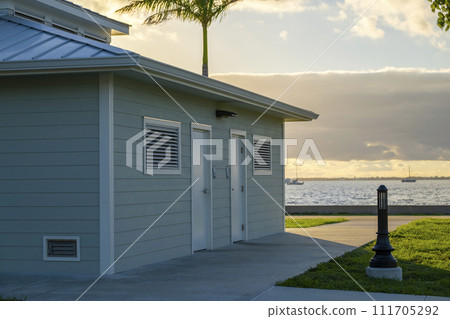 Public restrooms on Harborwalk at Gilchrist Park in Punta Gorda, Florida 111705292