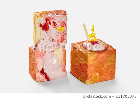 Flaky sweet cube croissants with raspberry custard and candied berries 111705375