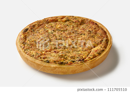 Traditional French savory cheese and spinach quiche on white Traditional French savory cheese and spinach quiche on white 111705510