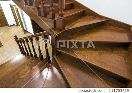 Close-up detail of brown wooden stairs 111705769