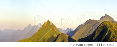 Carpathian mountain landscape in summer. Panoramic view. Sunset in Ukraine mountains. Wide panorama. 111705808