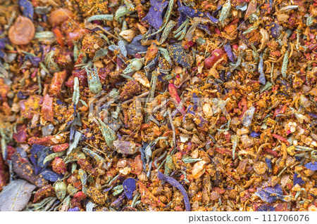 Abstract textured natural bright orange colorful copy space background. Millet, oak, different grains small particles, fish and parrot food. 111706076