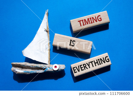 Timing is Everything symbol. Wooden blocks with words Timing is Everything. Beautiful blue background with boat. Business and Timing is Everything concept. Copy space. Timing is Everything symbol. Wooden blocks with words Timing is Everything. Beautiful blue background with boat. Business and Timing is Everything concept. Copy space. 111706600