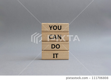 You can do it symbol. Concept words You can do it on wooden blocks. Beautiful grey background. Business and You can do it concept. Copy space. You can do it symbol. Concept words You can do it on wooden blocks. Beautiful grey background. Business and You can do it concept. Copy space. 111706808