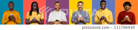 Group of six men with joyful expressions using smartphones, each dressed 111706930