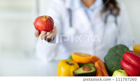 Nutritionist desk with healthy fruit and vegetable 111707260