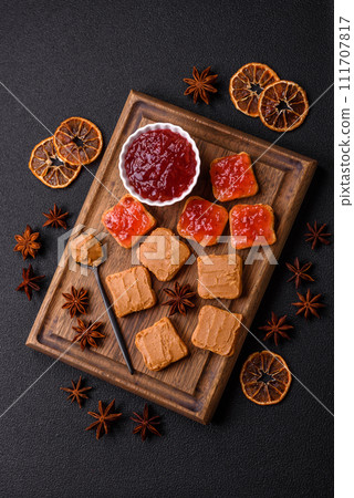 Delicious nutritious sandwiches with peanut butter, strawberry jam 111707817
