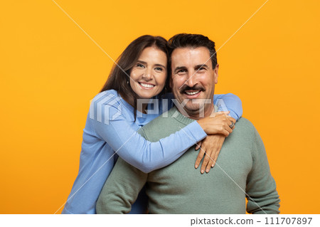 Positive senior caucasian woman hug man, enjoy spare time together 111707897